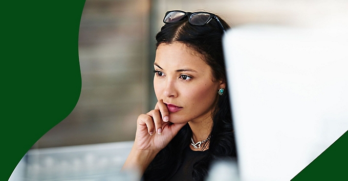 A person resting their hand on their chin.