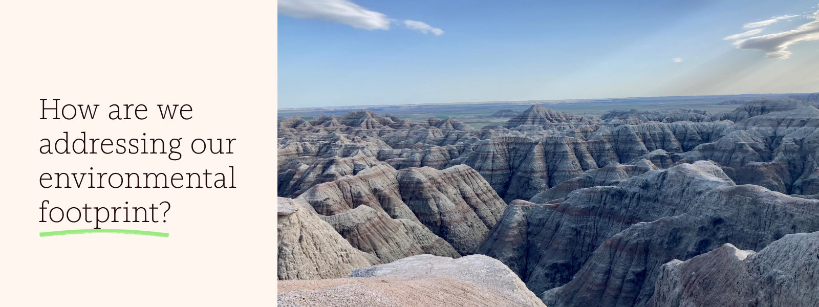 The question “How are we addressing our environmental footprint” alongside a view of deep canyons under a blue sky.