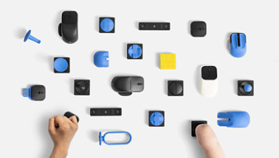 Various Microsoft Adaptive Accessories for Business, such as the Microsoft Adaptive Hub and the Microsoft Adaptive Mouse.