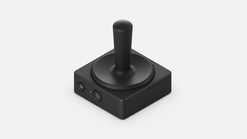 Vista en ángulo del botón joystick adaptable de Microsoft.