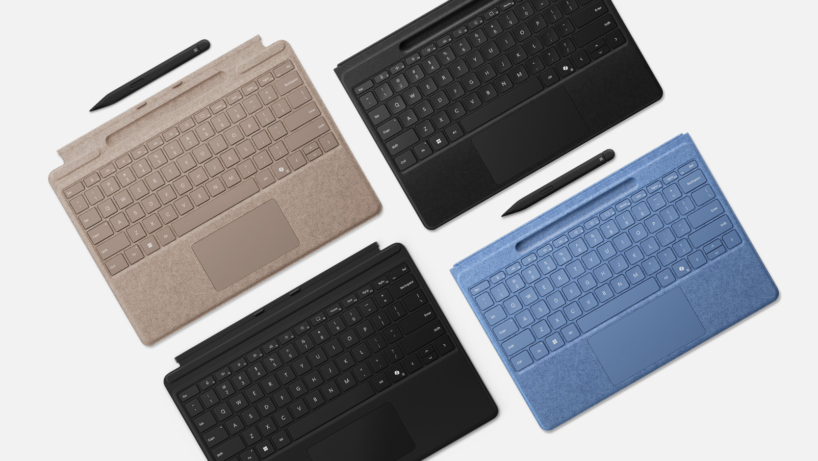 Una selección de teclados Surface Pro, algunos con almacenamiento de lápiz y Slim Pen.