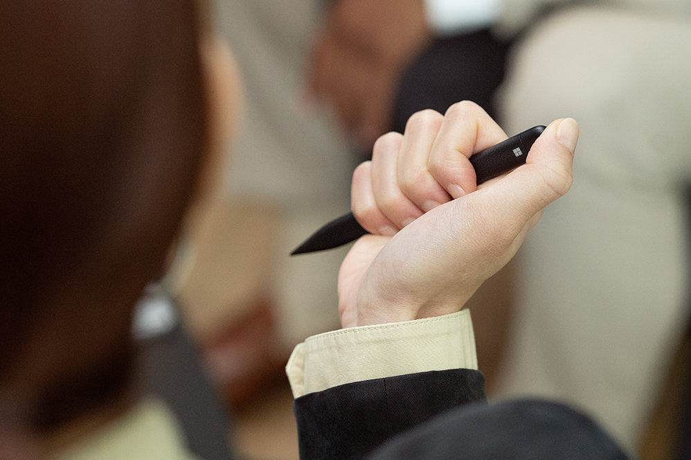 A person holds a Slim Pen 2.