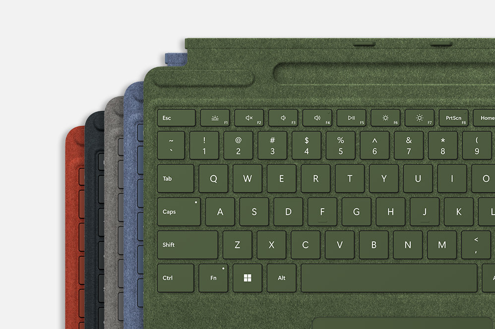 Fem Surface Pro Signature Keyboard-enheter i forskjellige farger.