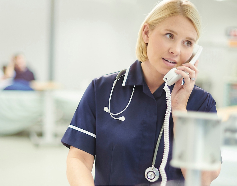 A nurse talking on the phone