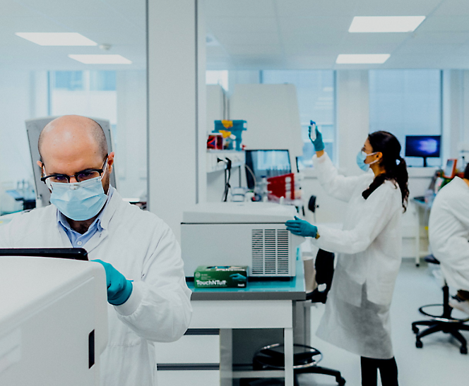 Researchers conducting experiments in a laboratory setting.