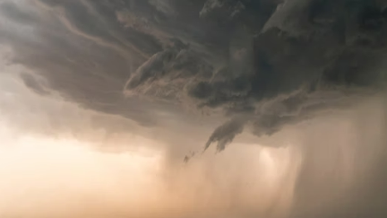 A tornado coming out of the sky