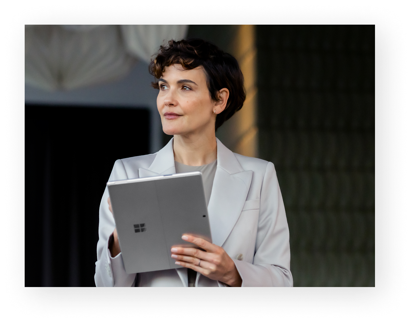 A women holding tablet