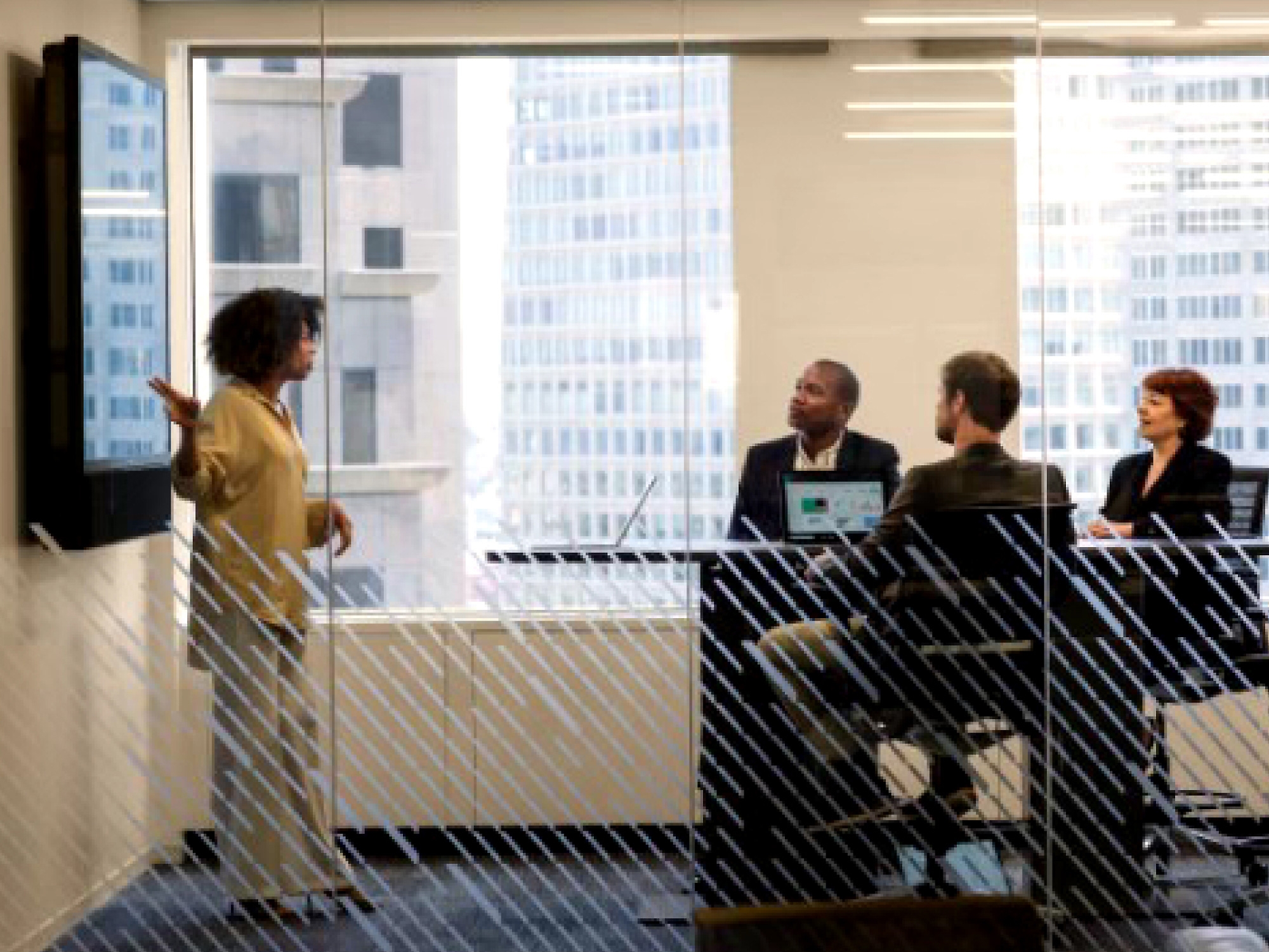 A group of people in an office.