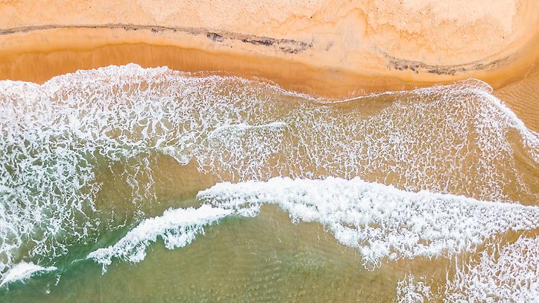 An aerial view of an ocean shoreline