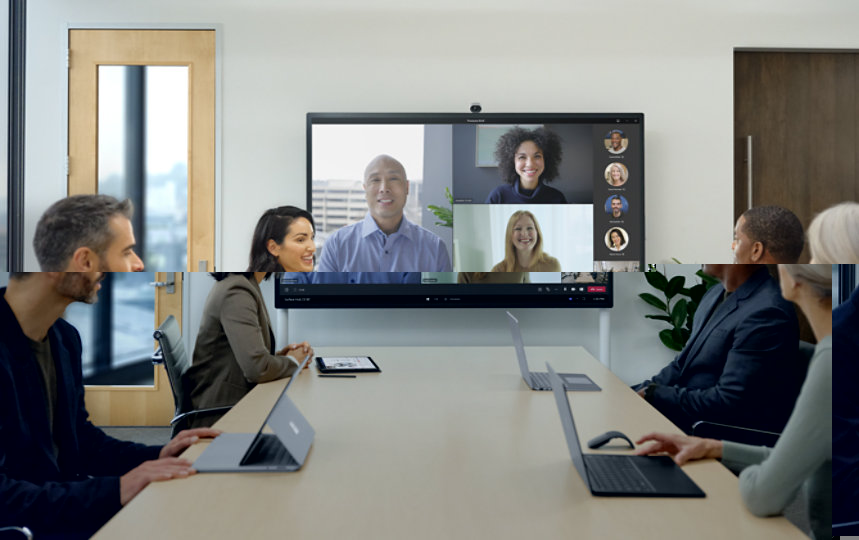 Teams meeting group shot with Surface Hub 2 Smart Camera above screen display