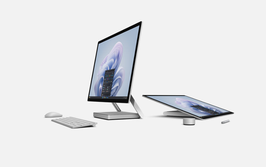 Surface Studio 2+ for Business in both upright and folded positions, next to a variety of Surface accessories.