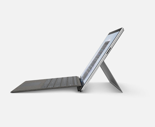 A side angle view of Surface Pro 9 for Business in Platinum. 