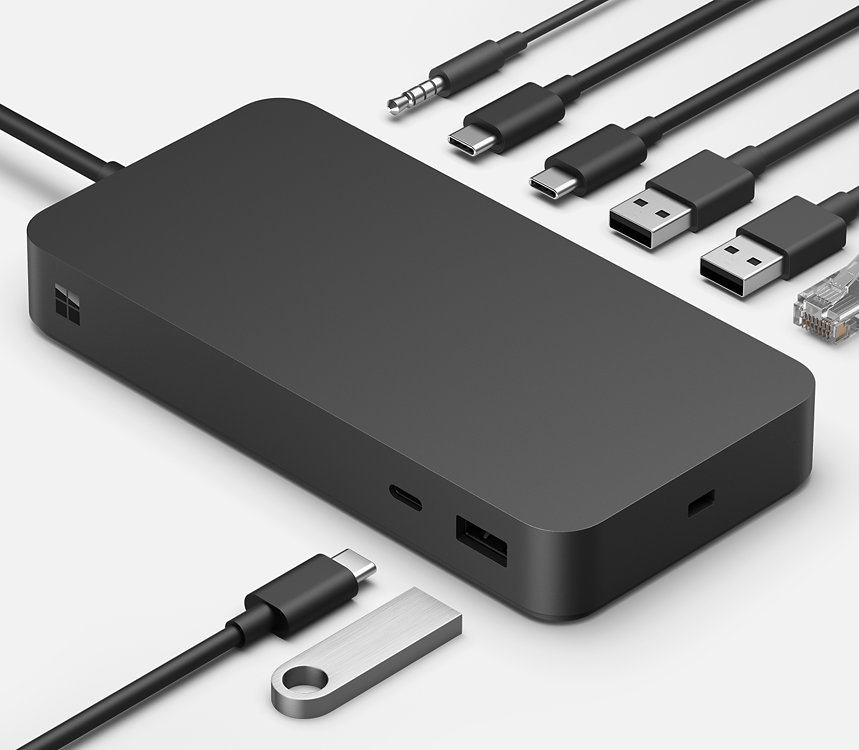 Los distintos puertos del Adaptador Surface Thunderbolt™ 4 rodeados de diferentes cables de conexión. 