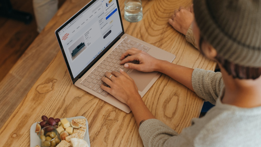 A person typing in a Microsoft Edge window