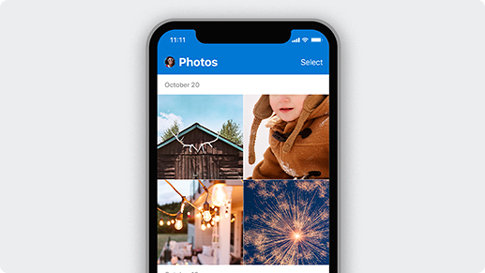 Mobile phone displaying photos