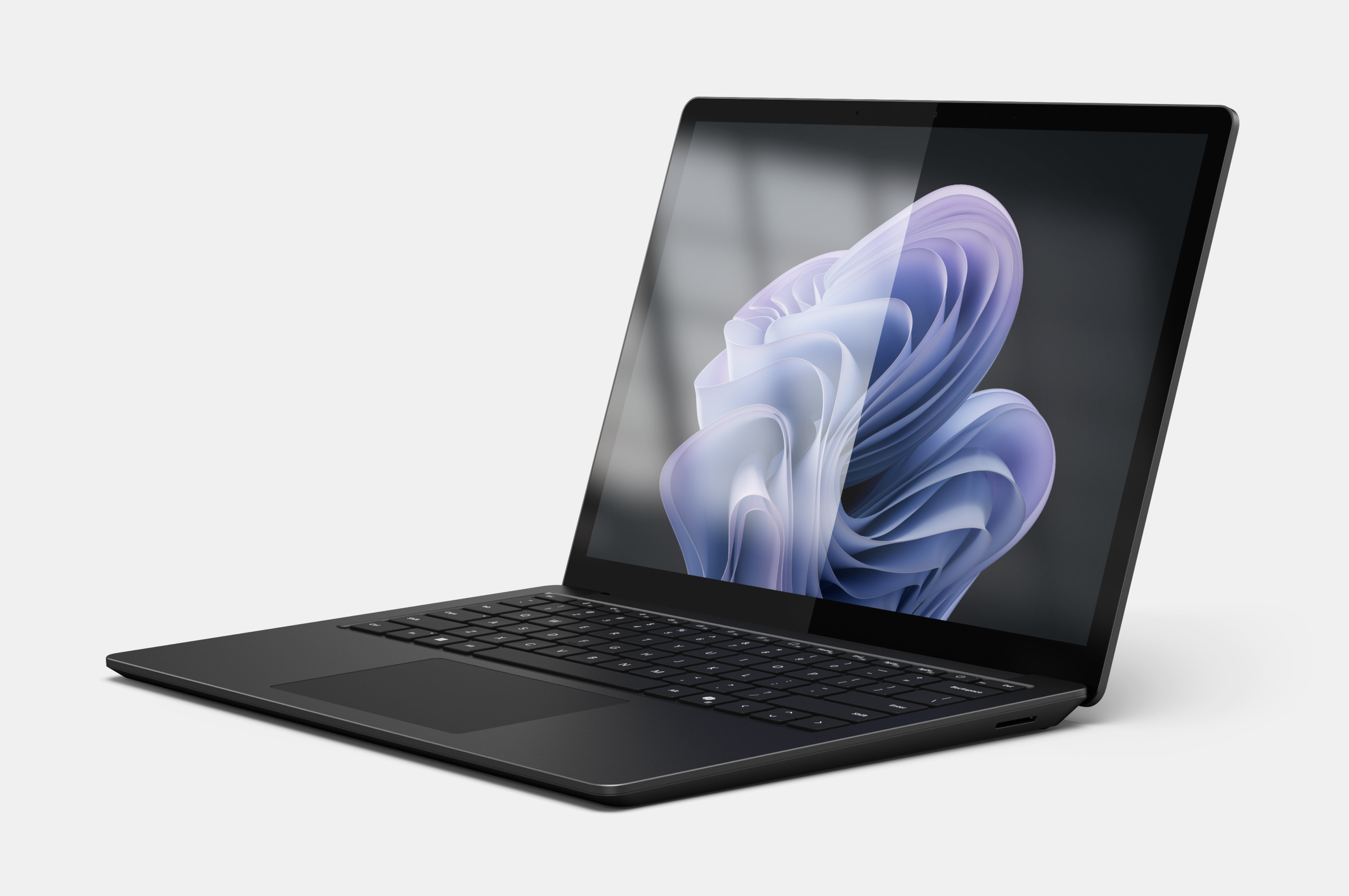 Kuvassa Surface Laptop 6 heijastamattomalla näytöllä ja ilman