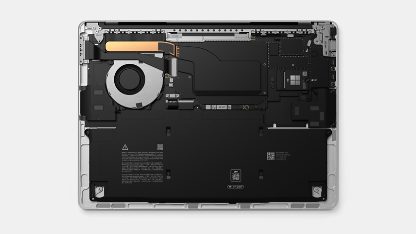 A Surface Laptop image showing the inside of the device, and the chip.