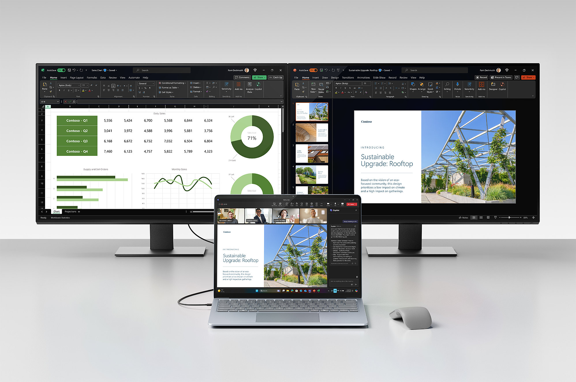 Two monitors connected to a Surface Laptop device through a Surface ThunderboltTM 4 Dock, with a Surface Arc Mouse to the right of the laptop.