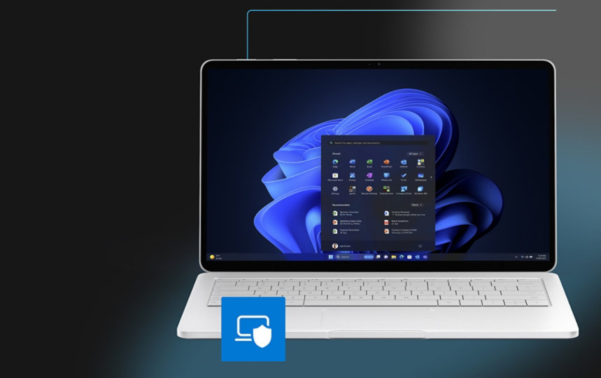 Ekran pulpitu systemu Windows 11 Pro i menu startowe paska zadań otwarte na laptopie.