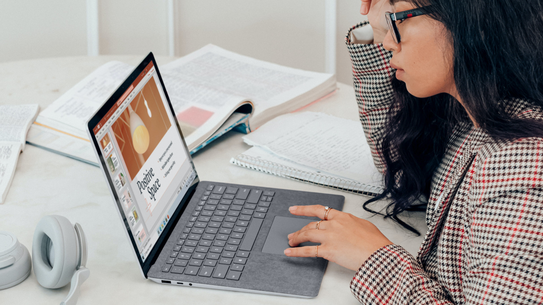 Woman studying with a Windows laptop