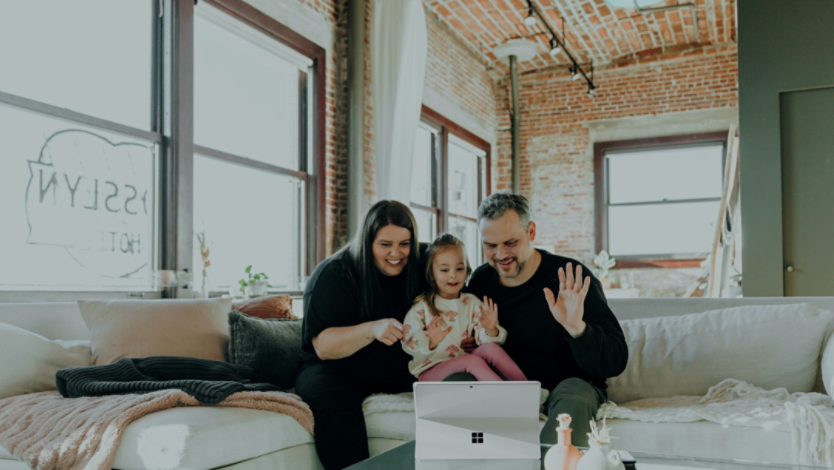 a family video chatting on a Surface Pro 2-in-1 PC