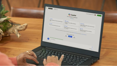 A person launching Microsoft Copilot on a laptop.