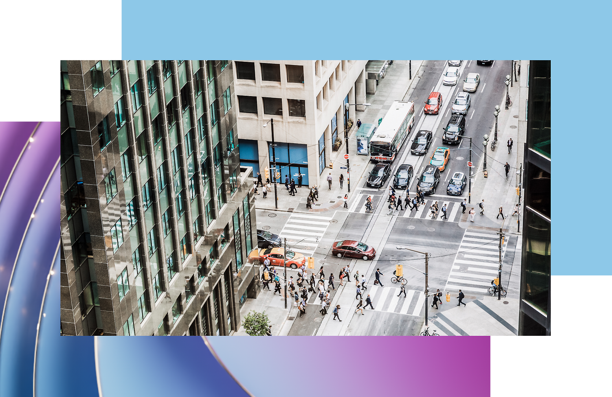 A group of people crossing a street.