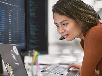 A person looking at a computer