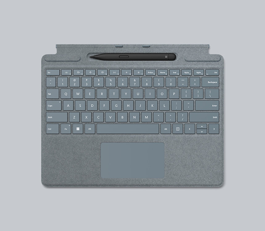 A surface Pro Type cover in gray with Slim Pen in pen dock.