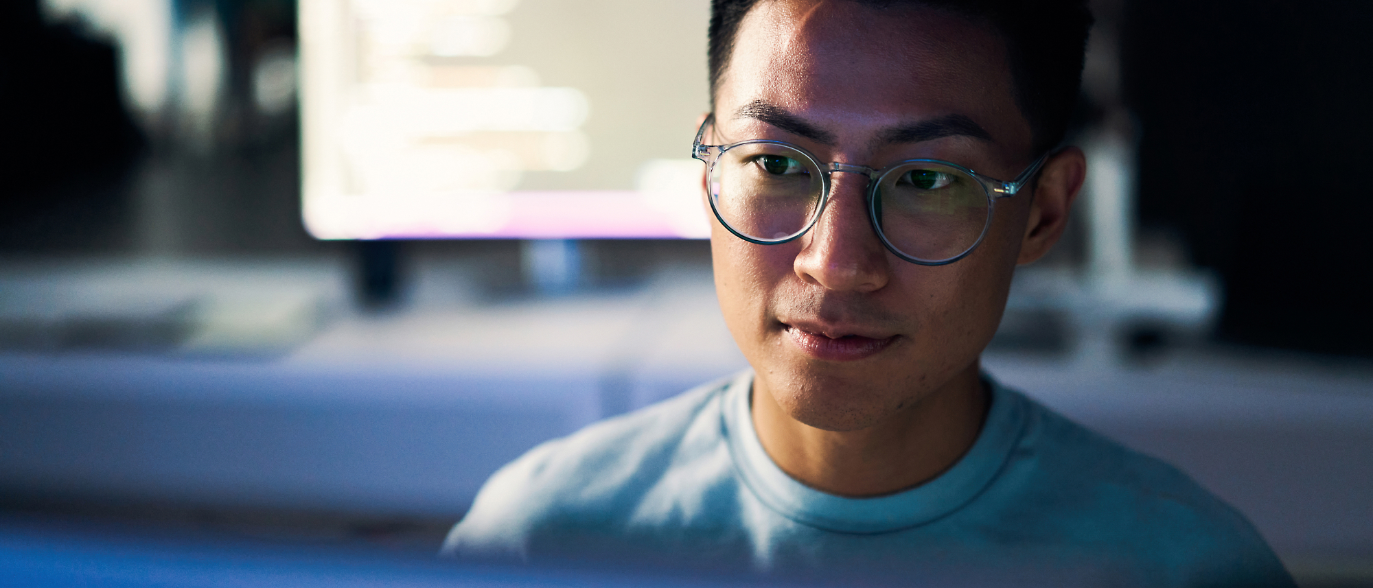 A man staring at a computer