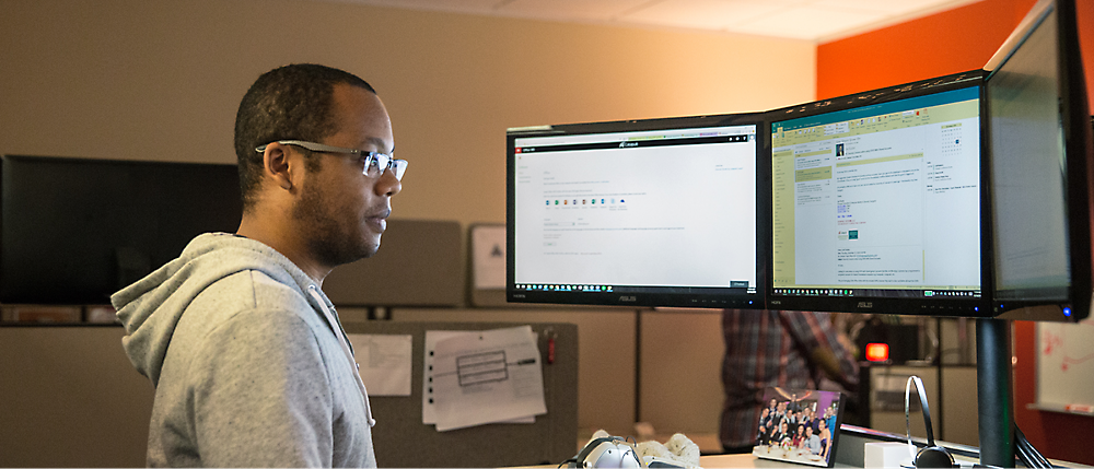 A person looking at a computer screen