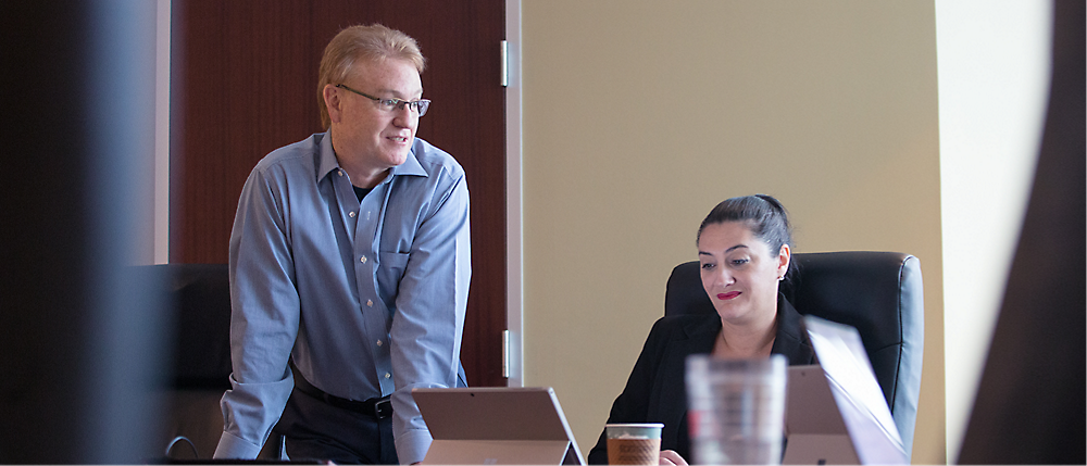 Two persons are in a meeting