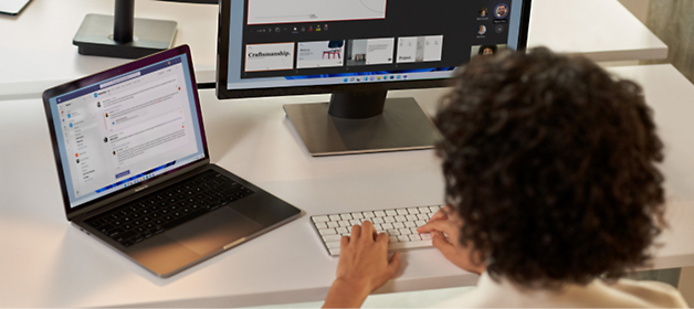 A person typing on a keyboard