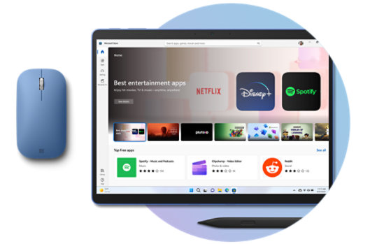 A tablet with a computer mouse next to it opened to the online Microsoft Store featuring apps and entertainment titles.
