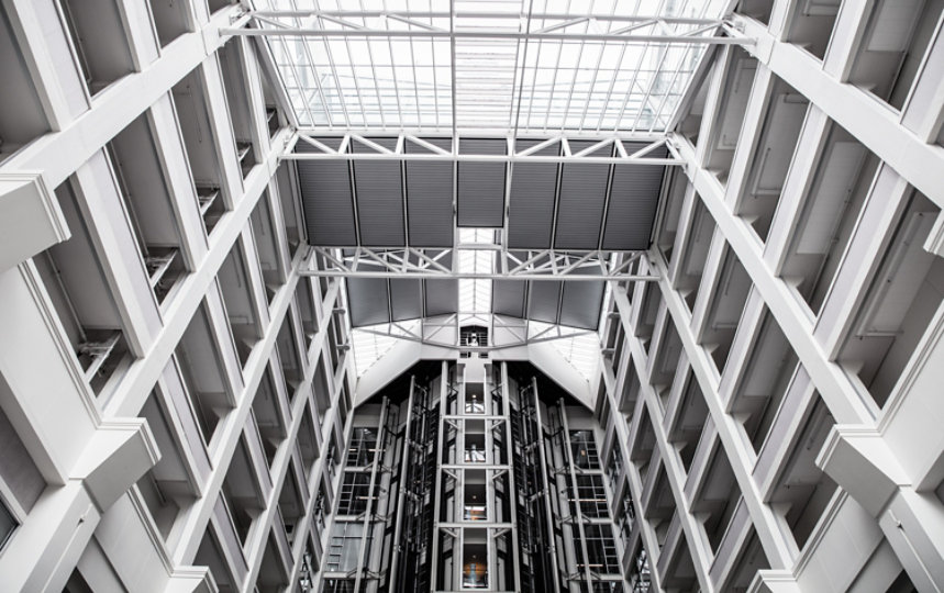 Interior upward angle view of building entrance hall.