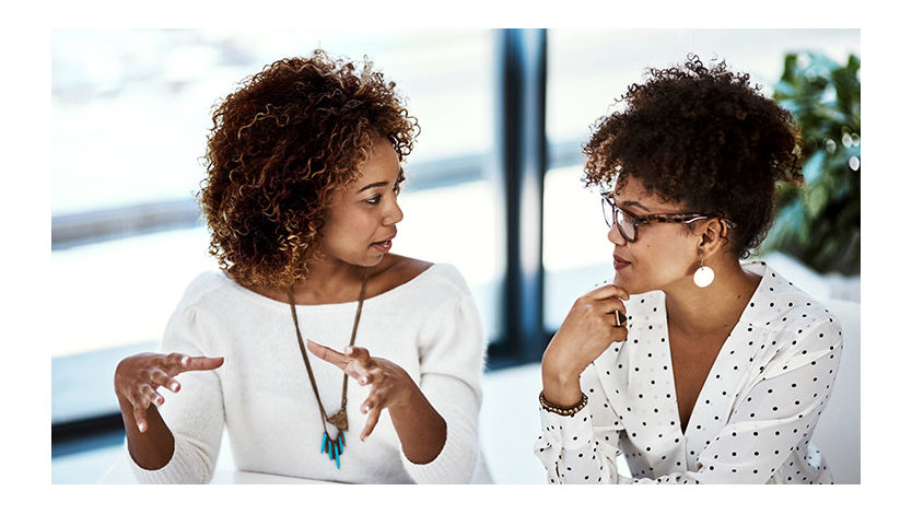 Two women engaged in conversation