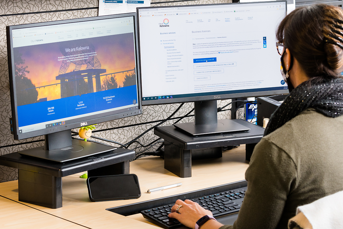 [11:20] Shishir Singh (iSoftStone Inc) A girl sitting at a desk with two computer screens