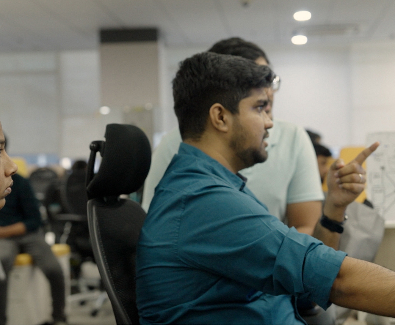 Two people discussing something in a office room