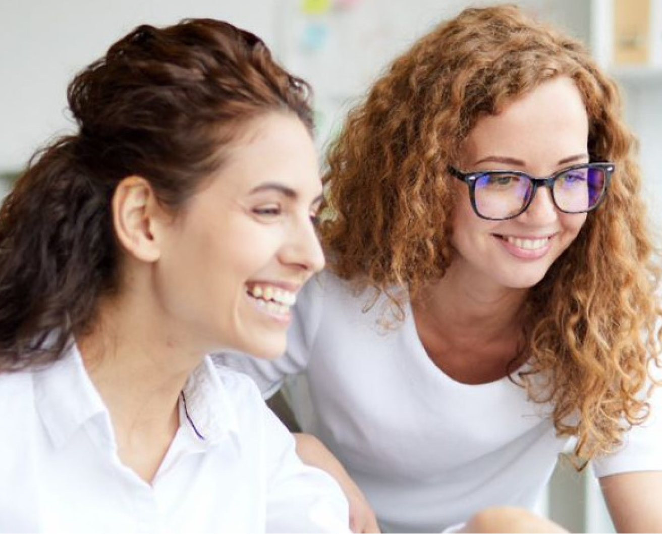 A couple of women smiling