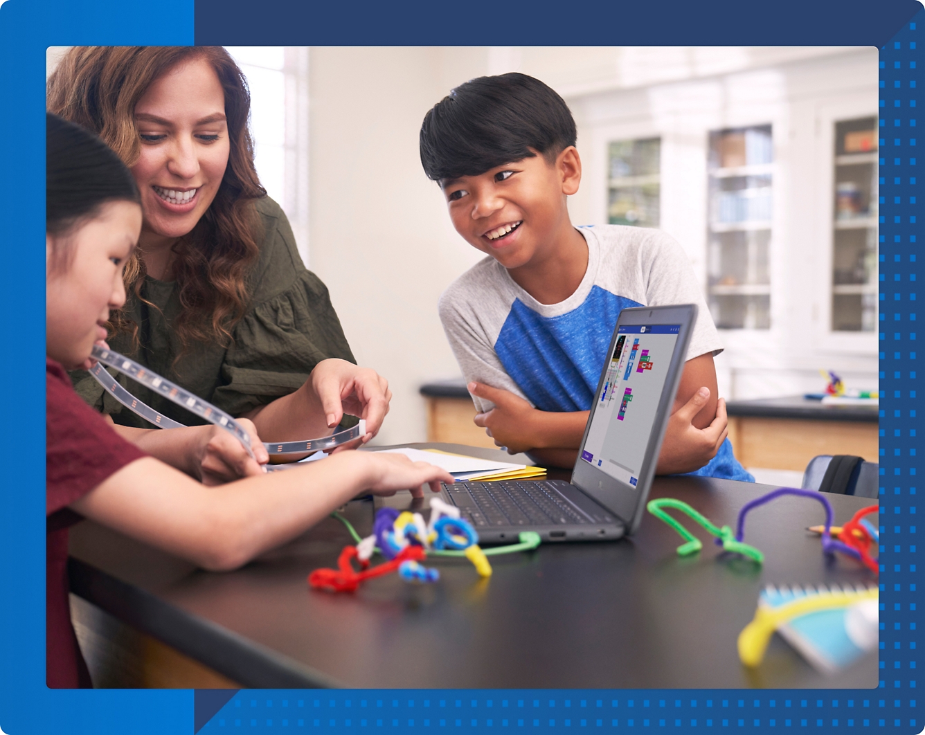 A group of children working on a computer