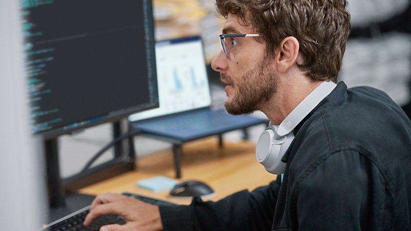 A person looking at a computer screen