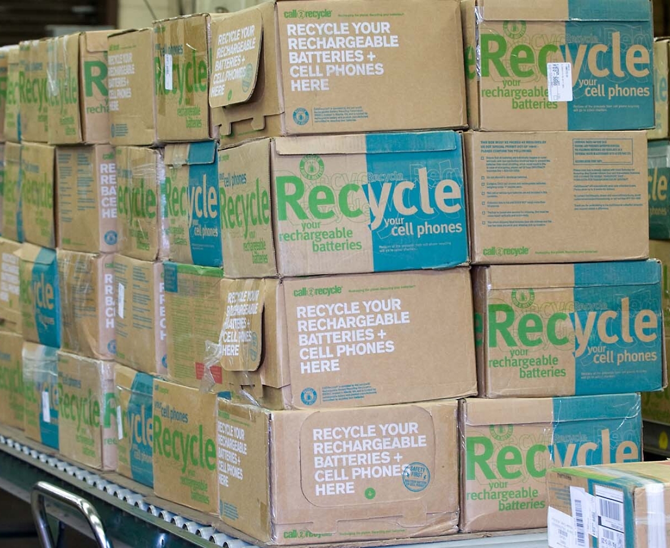 A stack of cardboard boxes in a warehouse.