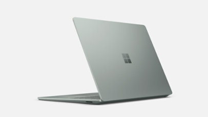 Surface Laptop 5 in sage shown from behind with the lid slightly closed