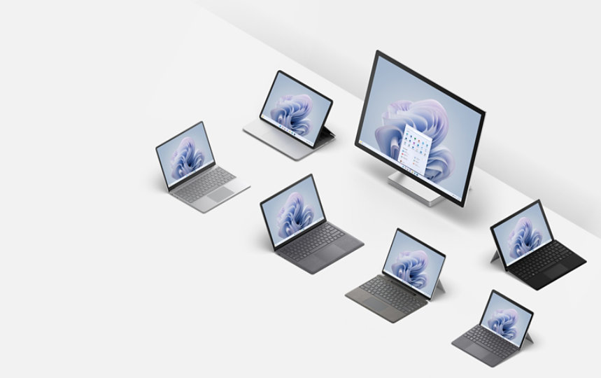 Surface device portfolio image with Laptop Studio, Studio 2 plus, Pro 7 plus, Laptop Go 2, Laptop 5, Pro 9, Go 3 in Platinum