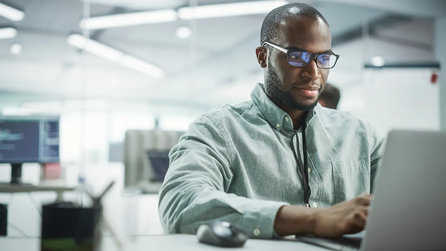 a man working on a laptop