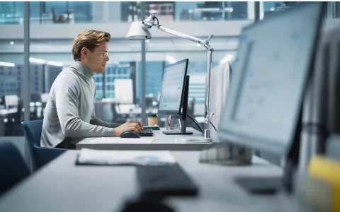 a man working on his computer