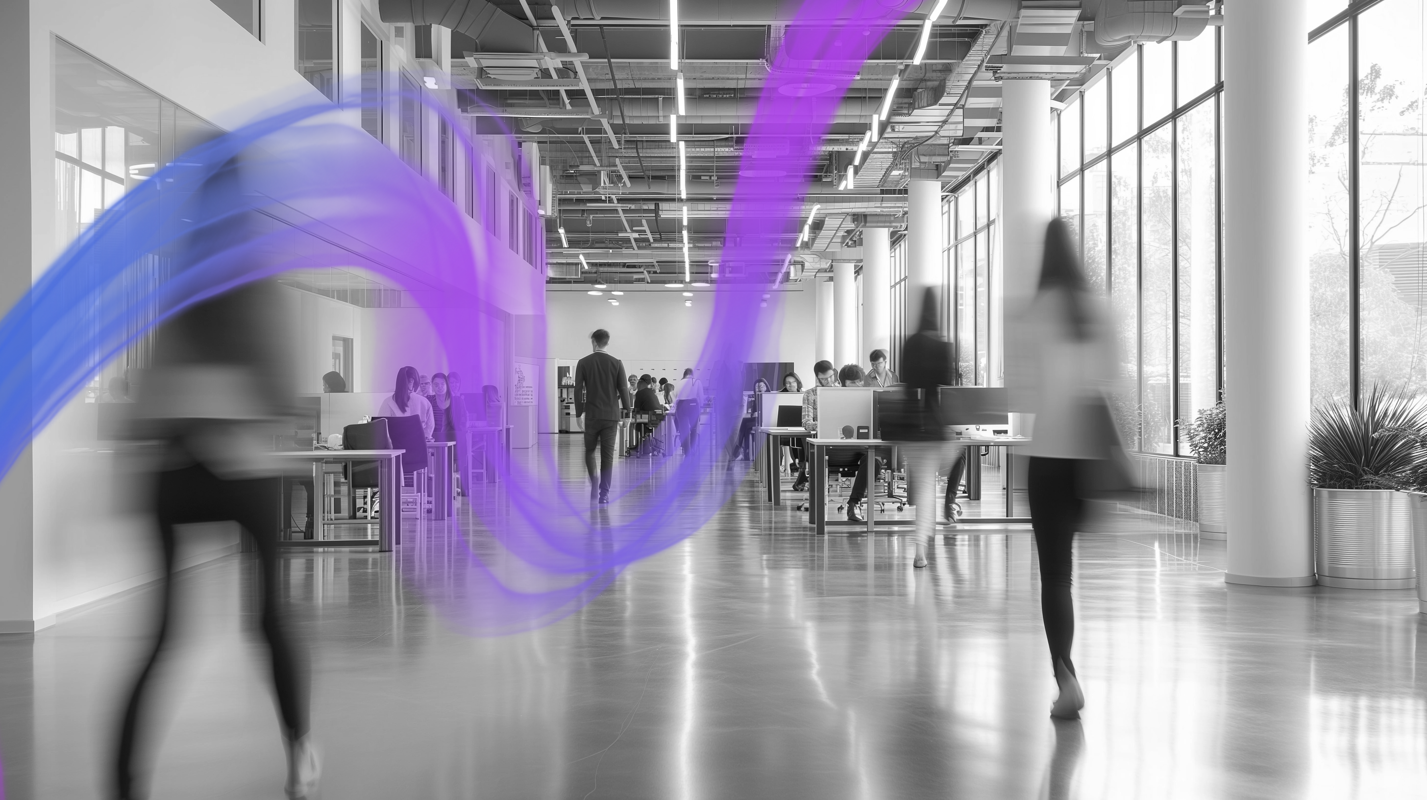 Black and white photo of an office with a vibrant purple wave coming through it showing the power of smart buildings.