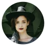 Photo of a young woman in a black hat in a circular frame - UserVoice Images