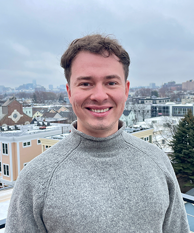 A headshot of Miles van Blarcum.