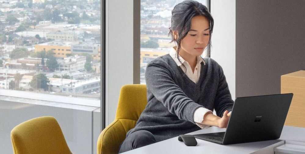 Woman using a Windows laptop